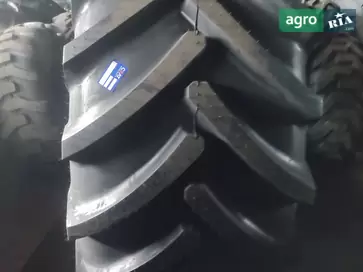 Шина для комбайна John Deere - фото