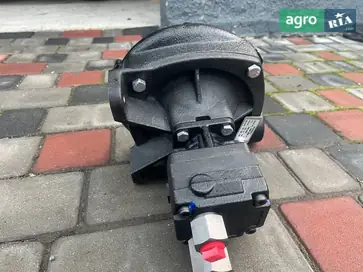 Насос до трактора John Deere - фото