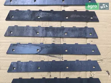 Накладка Claas 777615.0, 777629.0 для комбайна CAT Lexion - фото