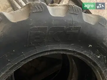 Шина до трактора John Deere - фото