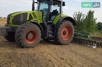 Трактор Claas Axion 950 2012 - фото