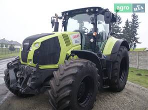 Трактор Claas Axion 2014