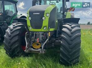 Трактор Claas Axion 2014