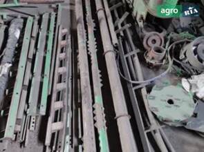Нижній вал соняшникової жатки Deutz-Fahr