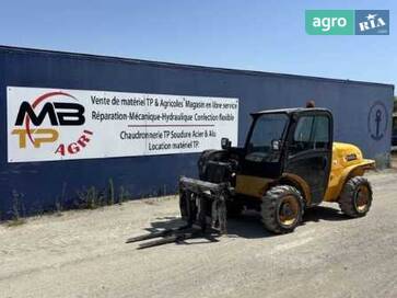 JCB 520-40  - фото