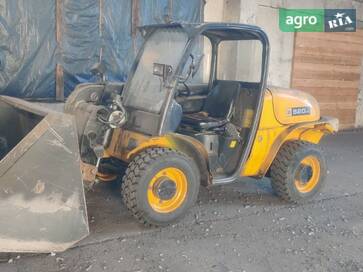 JCB 520-40  - фото