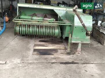 John Deere 332  - фото