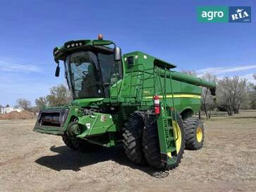 John Deere 670  - фото