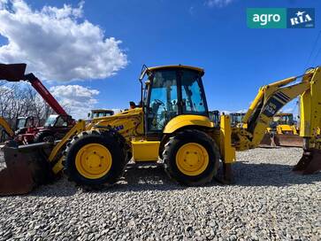 Komatsu WB93S-5E0  - фото